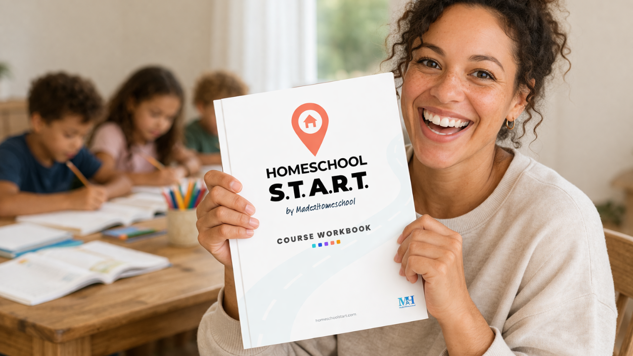 Mom holding the Homeschool S.T.A.R.T. course workbook